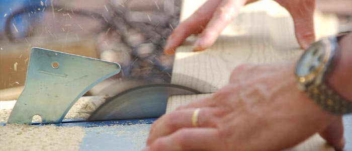 Craftsman using a table saw